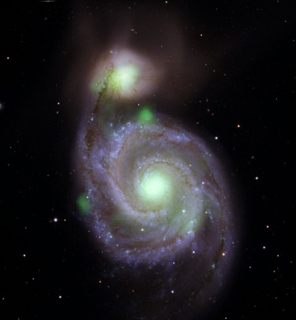 NuSTAR hard X-ray image of the Whirlpool galaxy and M51b compared to the optical